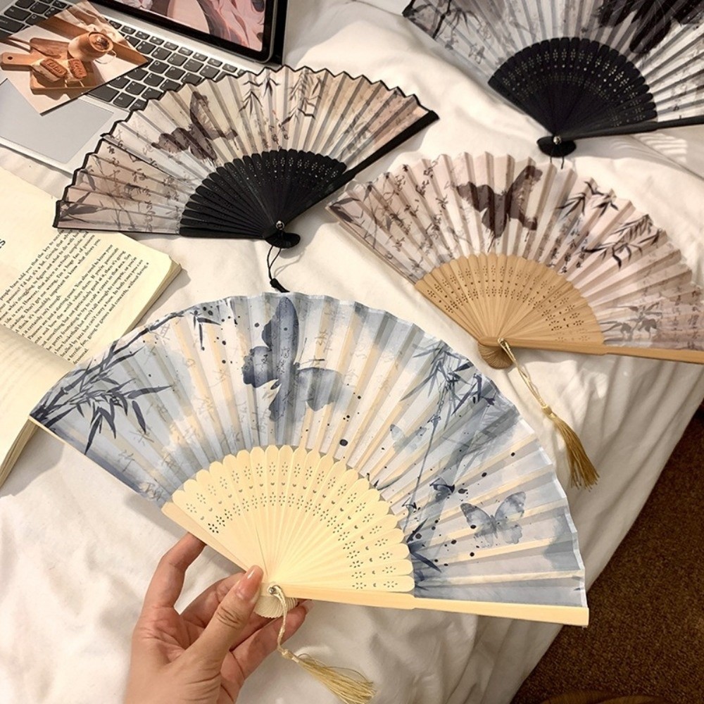 مروحة يدوية قابلة للطي بتصميم  - مراجعة Art And Craft Photos وسعره